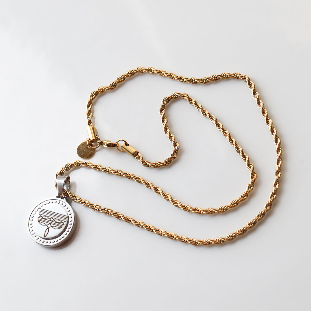 The Boot Stitch Pendant