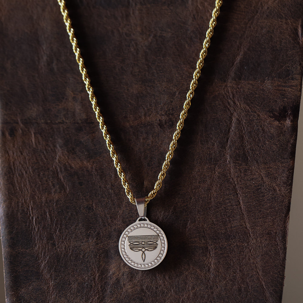 The Boot Stitch Pendant