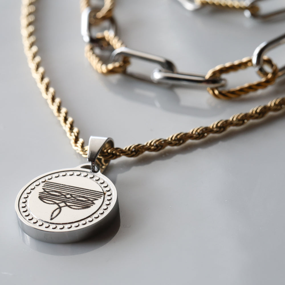 The Boot Stitch Pendant